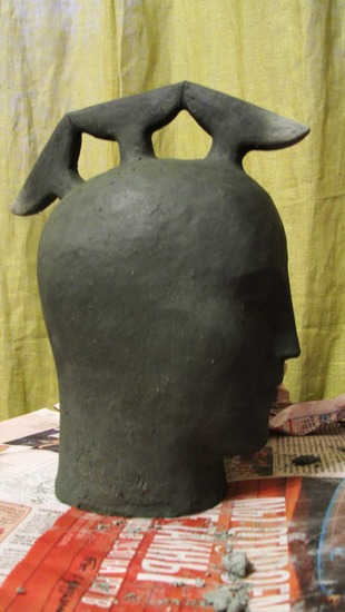 Глиняная голова